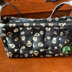 HARVERYS DISNEY COUTURE NIGHTMARE BEFORE CHRISTMAS purse. Made with seatbelts!